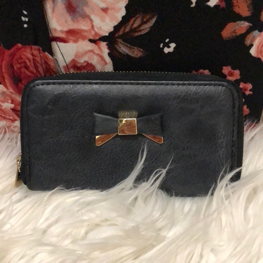 Black wallet/clutch with gold bow tie